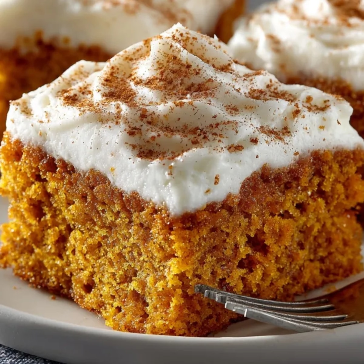 Golden Pumpkin Spice Sheet Cake Squares, perfect for fall baking and parties!