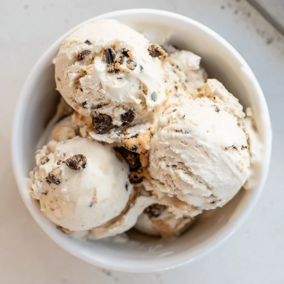 Irresistible Cottage Cheese Ice Cream enriched with edible cookie dough, a perfect summer treat.