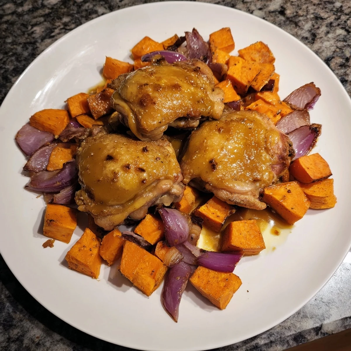 Savory Maple Glazed Chicken & Sweet Potato Bake, a flavorful and comforting dish perfect for a fall evening meal.
