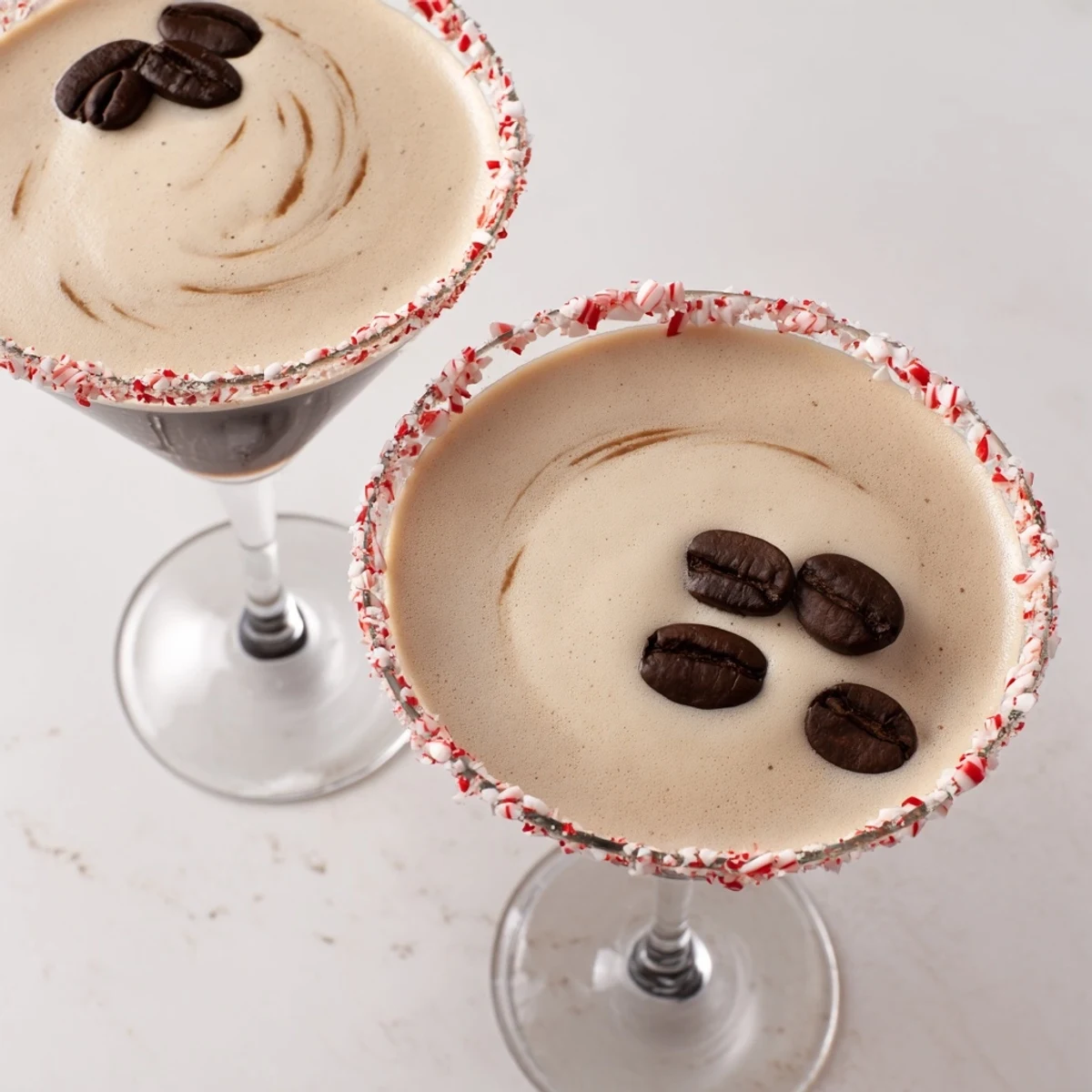 A chilled Peppermint Espresso Martini, garnished with espresso beans, ready for a cozy holiday toast.