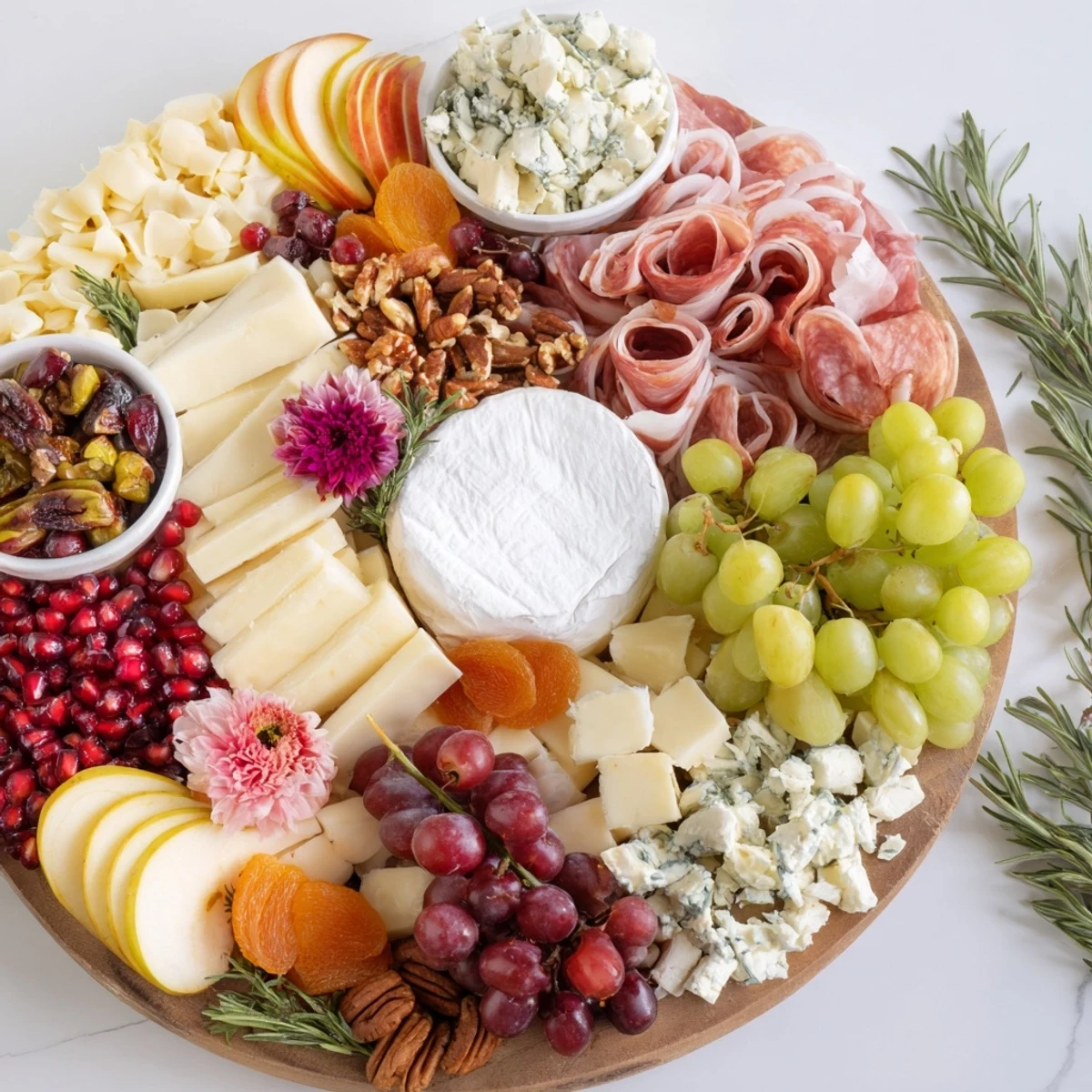 An appetizing Winter Wonderland Grazing Tray, overflowing with cheeses, fruits, and meats for sharing.