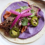 Savory Korean bulgogi tacos served with zesty pickled red onions and fresh cilantro.  