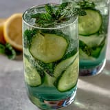 Cool and vibrant Sparkling Cucumber Mint Lemonade Mocktail ready for summer sipping.