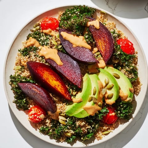 Steaming quinoa, kale, and beets: A colorful Quinoa, Kale & Roasted Beet Bowl with creamy tahini.
