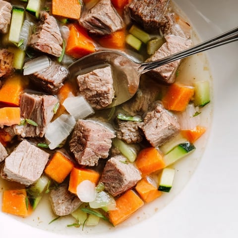 Sweet Lamb Platter for Babies: Tender lamb stew with soft veggies, ready to serve in baby bowls.