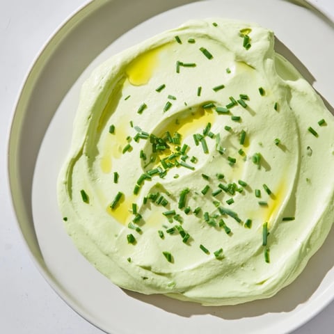 Creamy Avocado Cottage Cheese Dip, a vibrant green dip ready to be paired with fresh vegetables.