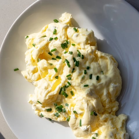 Fluffy Cottage Cheese Scrambled Eggs, a golden breakfast, ready to be enjoyed with toast.