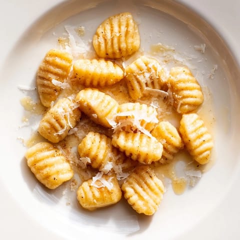 Sweet Cinnamon Sugar Ricotta Gnocchi, light and pillowy, a dessert you can cook at home.