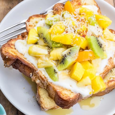 Creamy coconut Yogurt-Custard Toast baked to perfection and garnished with fresh kiwi.  