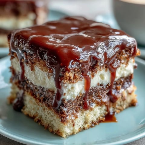 Elegant high school graduation cake with gold foil and diploma topper, perfect for celebrating academic achievements.