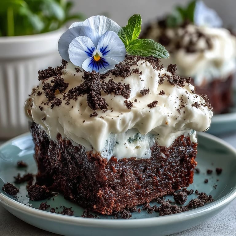 Rich Mother's Day Flower Pot Brownies topped with Oreo dirt and flowers.